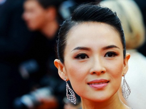 14-5-16-16959Chinese actress Zhang Ziyi poses as she arrives at the opening red carpet event of the 67th Cannes Film Festival in Cannes France 14 May 2014